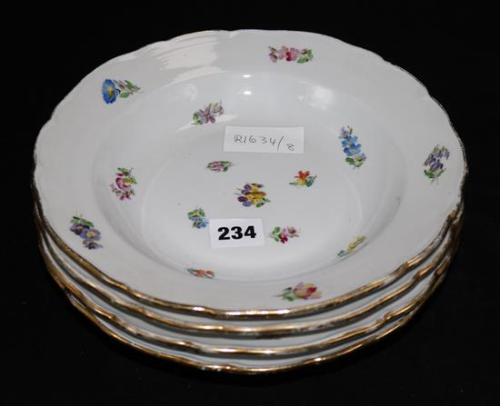 Four Meissen soup plates